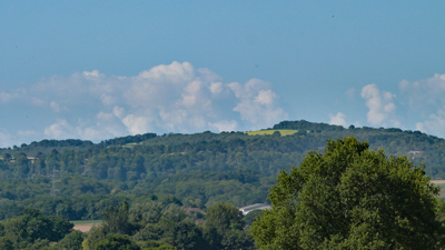 Clouds bubble up on the horizon